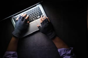 Hacker at laptop